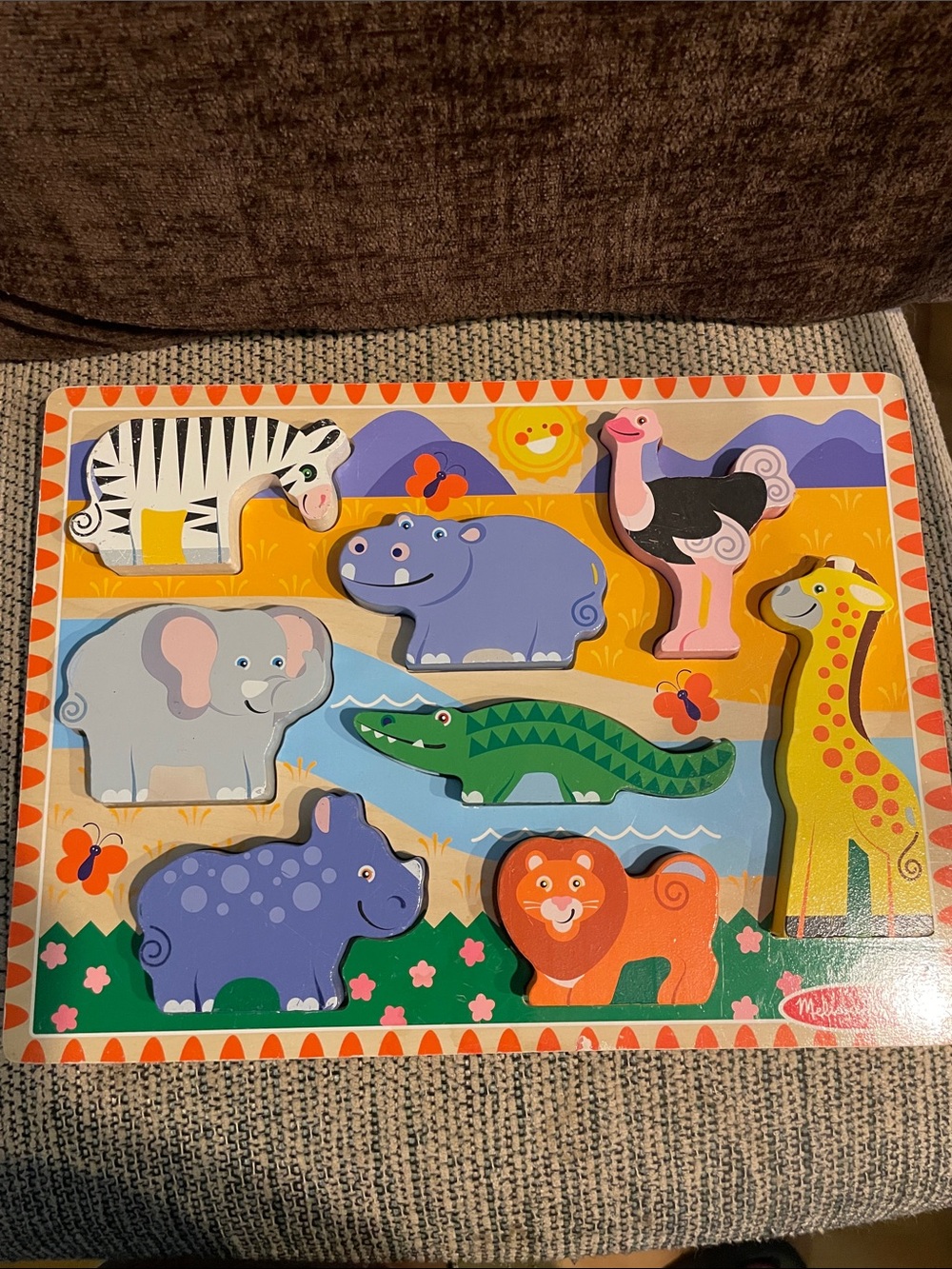 Two Melissa & Doug chunky wooden puzzles. Safari & Farm animals.